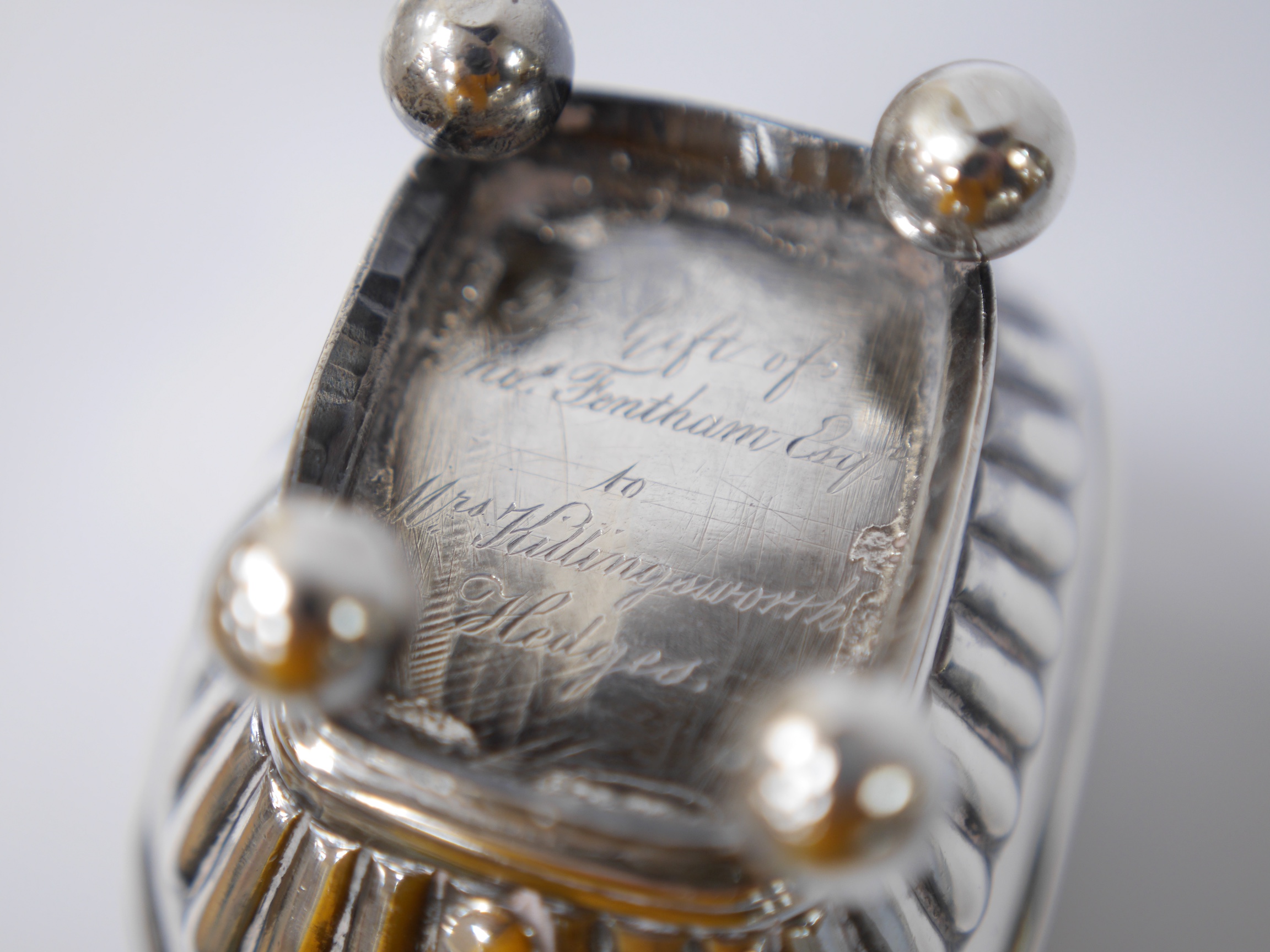 Two George III silver cream jugs, one demi-fluted, with engraved inscription to the base, London, 1807, both with engraved monogram, 11.3oz. Condition - poor to fair